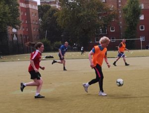 Florence from women in sport and Debbie from Sported playing football