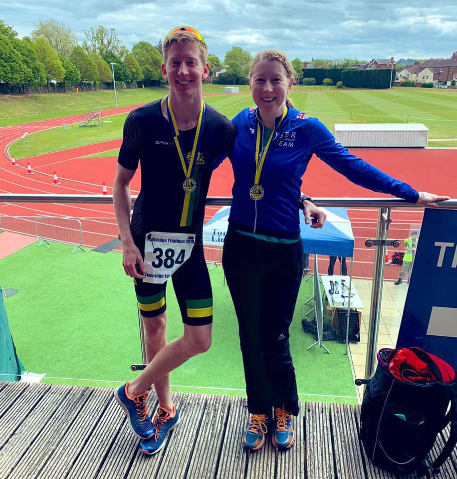 Jenni and Tom Anderson wearing their medals after the 2019 Tonbridge Triathlon.